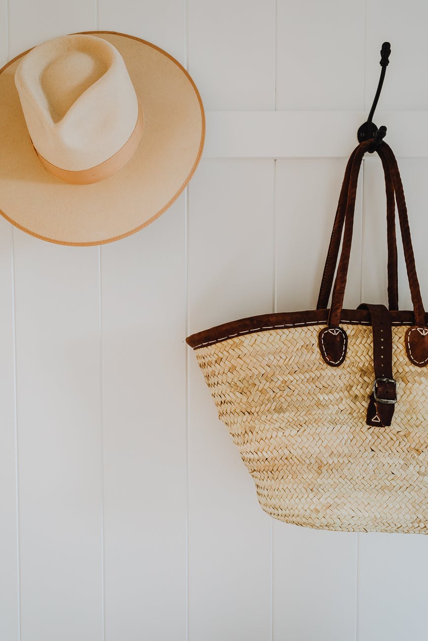 hat and handbag on hooks