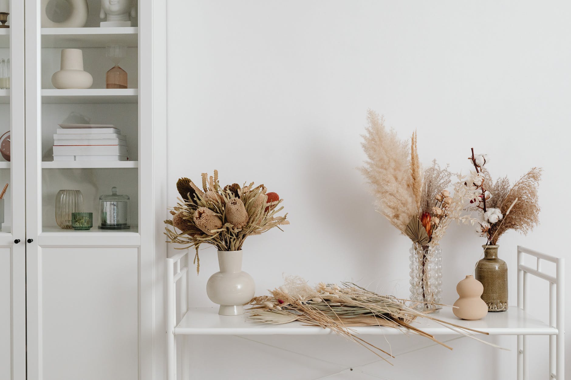 dried flower bouquets on white table