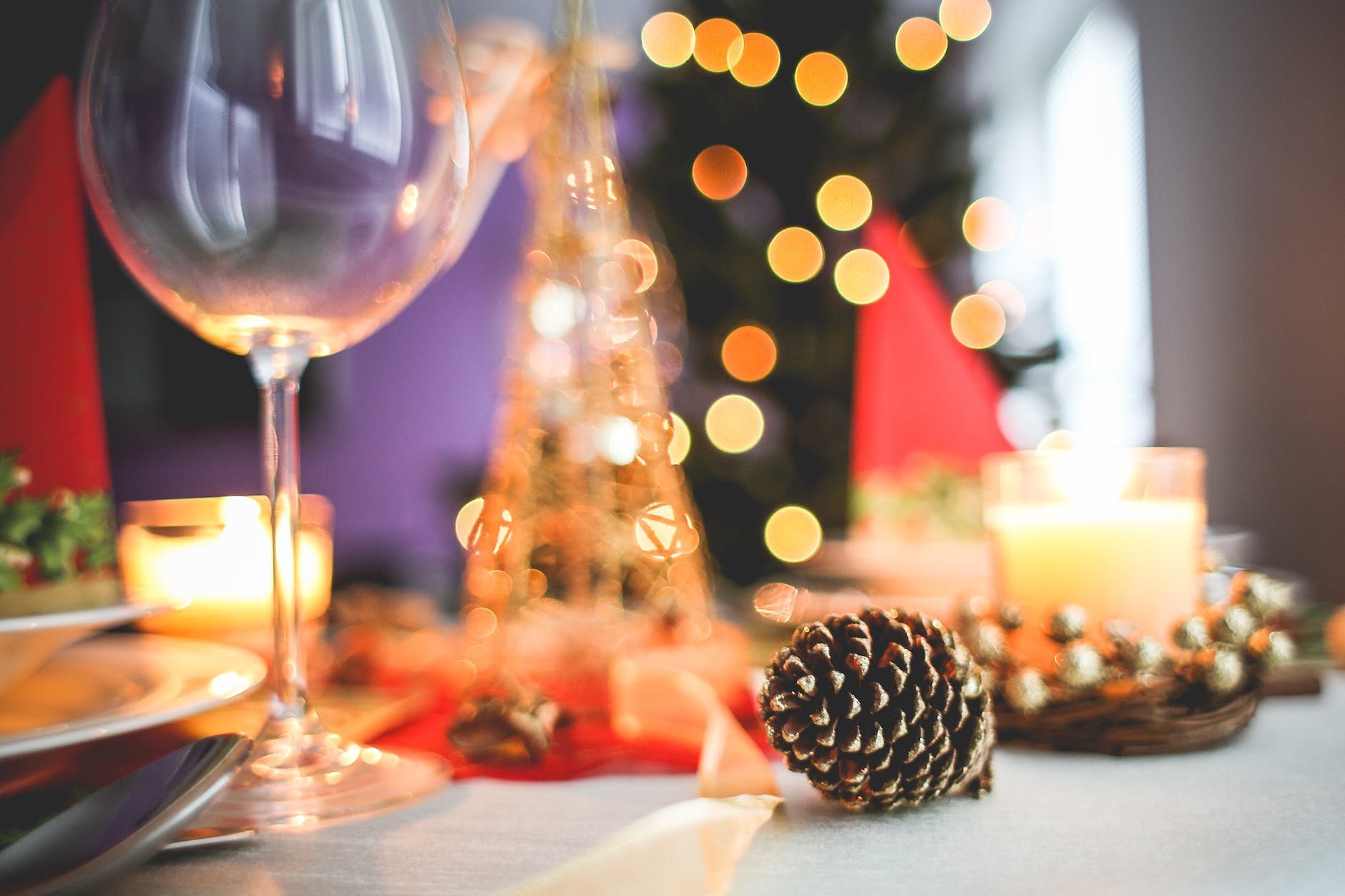 brown acorn near clear long stem wine glass